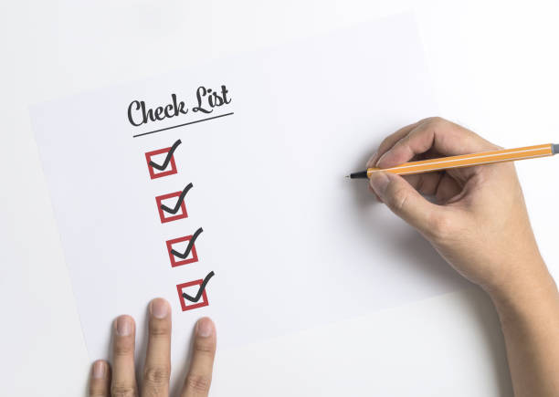 istock Hand is writing and checking the Checklist on paper backgroundboxbusinesscheckchecklistcheckmarkchoiceclipboardconceptdocumentflatformhandhappyillustrationnotebookpaperpenpeoplesolutionstrategysurveysymboltabletickwhitewoodenwordworkwritewritingShow more 892183218