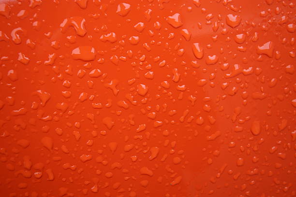 texture - raindrops on orange stock photo