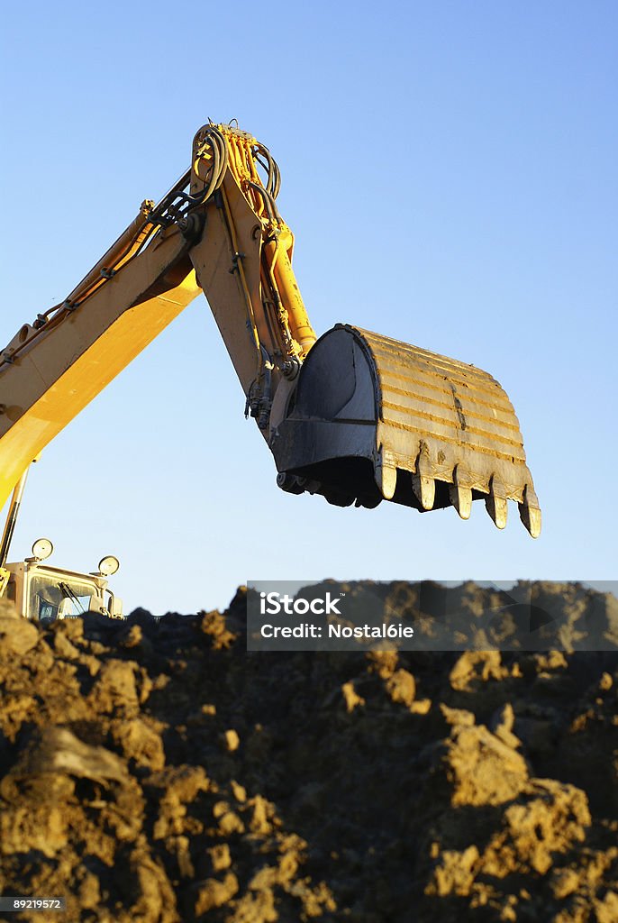 Hidráulicos excavator no trabalho - Royalty-free Amarelo Foto de stock