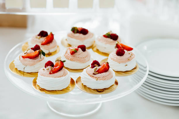 istock Table with loads of cakes, cupcakes, cookies and cakepops. 892196324