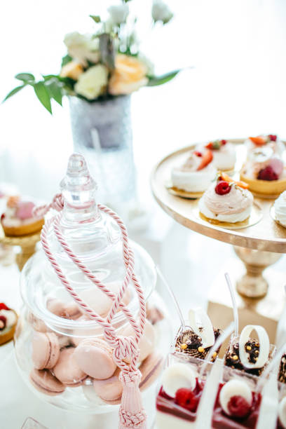 istock Table with loads of cakes, cupcakes, cookies and cakepops. 892196414