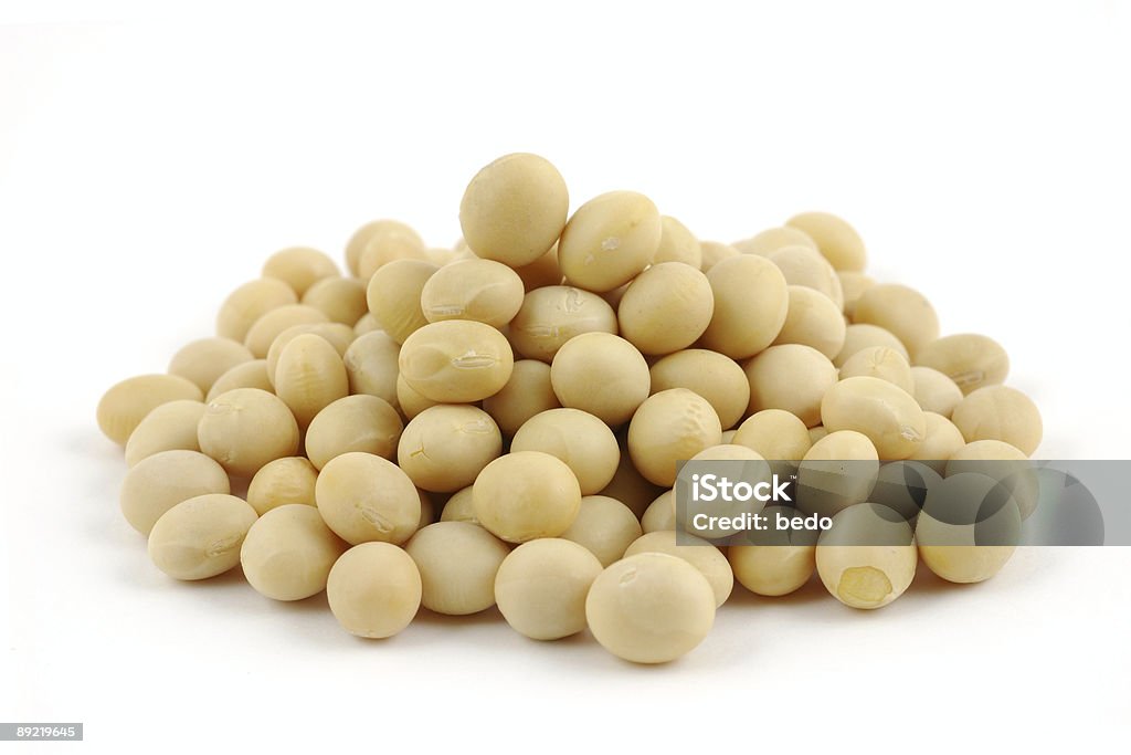 A close-up of a pile of white soybeans Close up of soy beans in isolated white background Asia Stock Photo