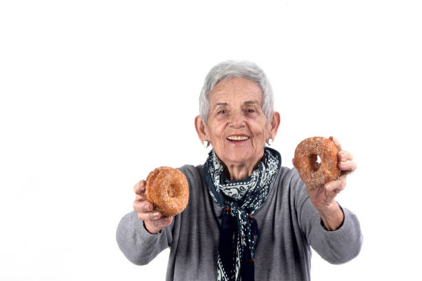 istock senior woman eating 892196784