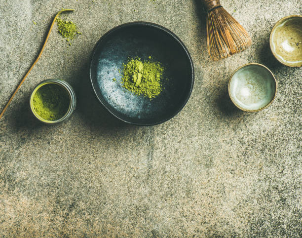 istock Japanese tools for brewing matcha green tea, grey concrete background 892199330