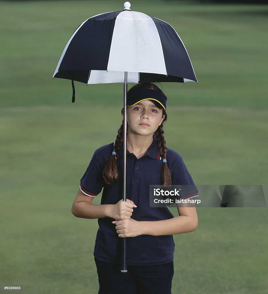 Girl with Umbrella  10-11 Years Stock Photo