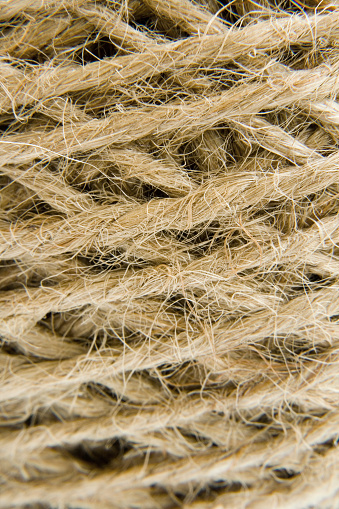 A ball of twine on a white background and close ups in Macro