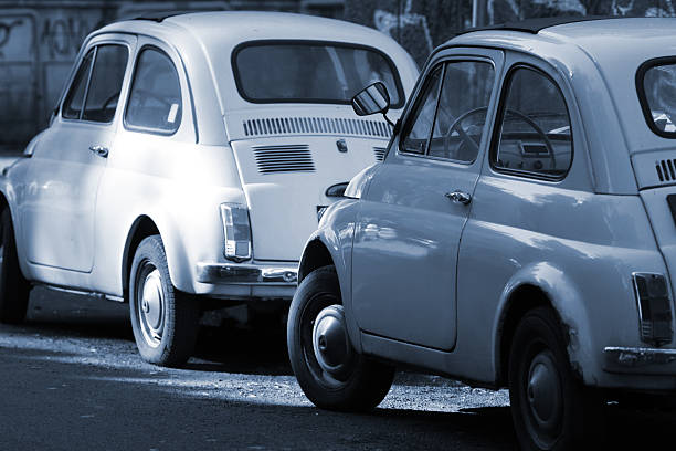 istock Tiny twin vintage cars in Rome, Italy 89221042