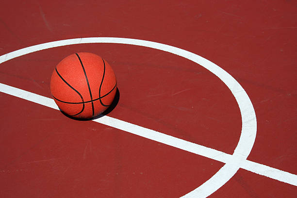 istock Basketball at center court 89221572