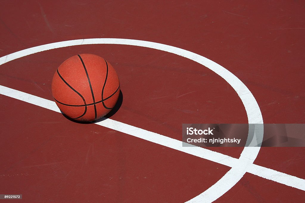 Basketball at center court  Backgrounds Stock Photo