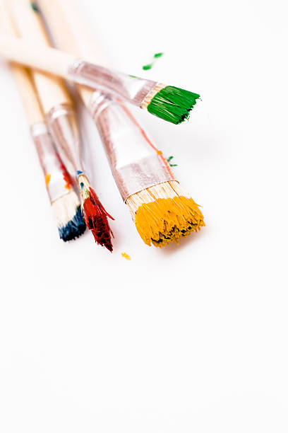 istock used paint brushes of different colors 89222641