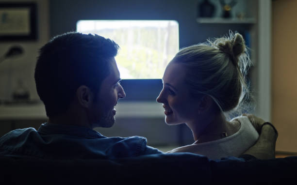 istock Settled in with a romantic movie 892227098