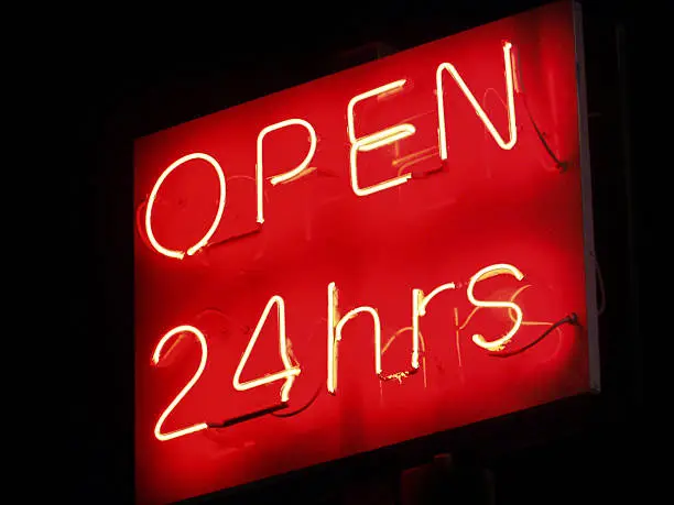 Photo of Open 24 hrs neon sign
