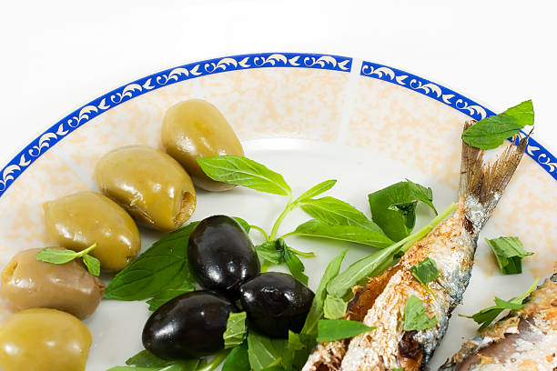 Fried fish with olives