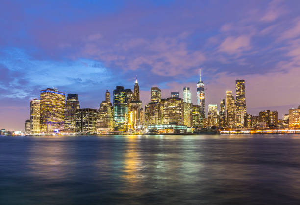 istock panoramic view to New York by night 892244984