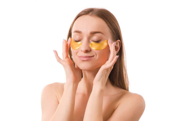 istock Beautiful young woman face patches under eyes 892245864