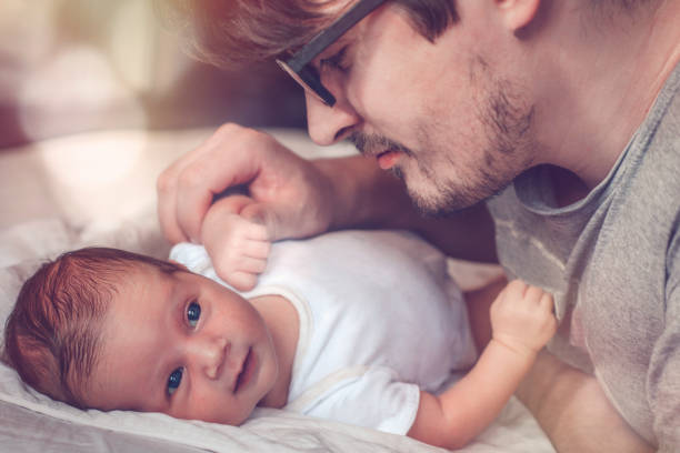 istock Father with newborn baby 892252436