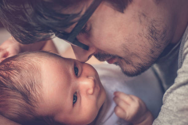 istock Father with newborn baby 892252456