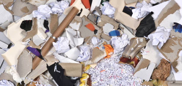 istock inside of a paper recycling container 892254916