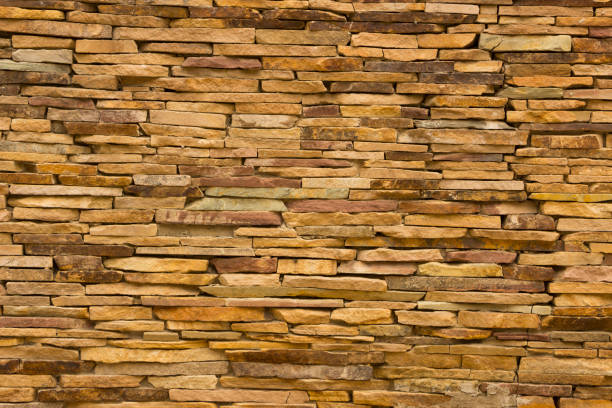 istock Modern Multi Color Stone, slate travertine sandstone Wall used for Background 892255442
