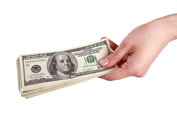 istock Hand with money on white background (isolated) 89225765