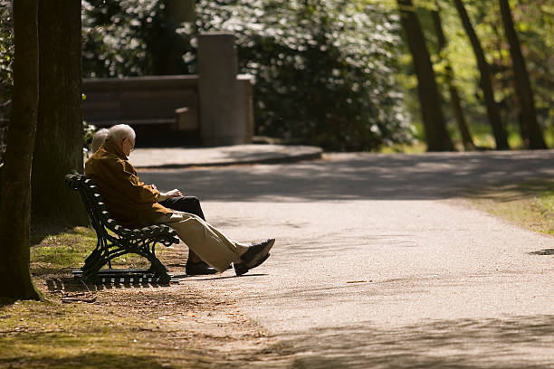 istock Eldery people sitting in the park 89226072