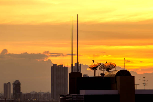 istock Sunshine sun sky yellow background and top building 892260862