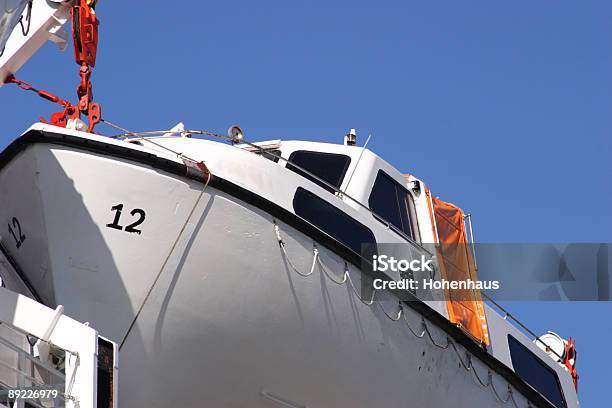 Emergency Life Boat Closeup Stock Photo - Download Image Now - Blue, Boat Deck, Cable Winch