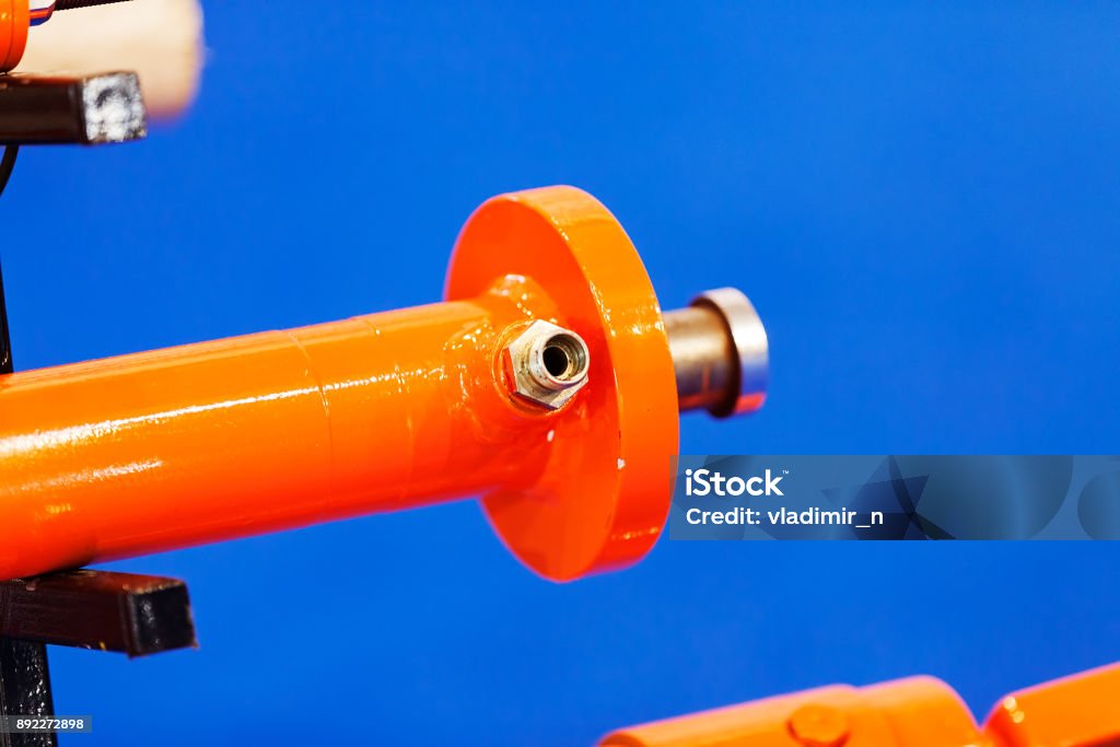 detail of metal processing machines detail of metal processing machines on the blue background, note shallow depth of field Accuracy Stock Photo