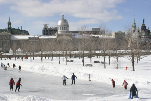 Winnipeg, Manitoba / Canada - February 16, 2020: Family Ice Skating at Assiniboine Park.