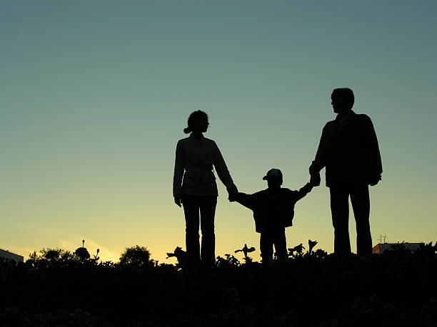 istock family with boy sundown 2 89227583