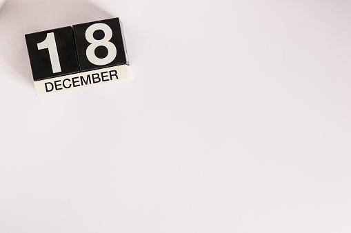December 18th. Day 18 of month calendar on white background. Winter concept. Empty space for text.