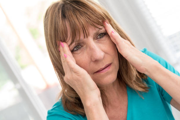 istock Mature woman having a headache 892293900