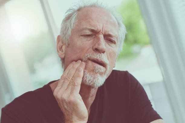 istock Portrait of mature man with toothache 892294522