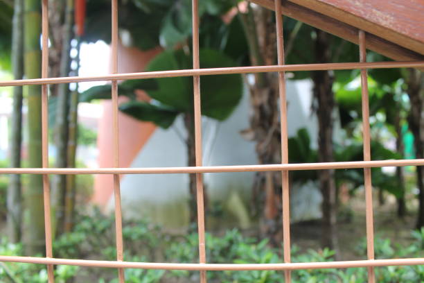 istock Steel orange nets with blurry background for web site or mobile devices 892294626