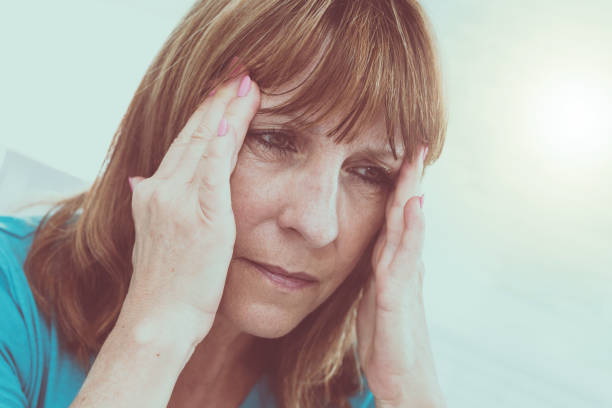istock Mature woman having a headache 892300576