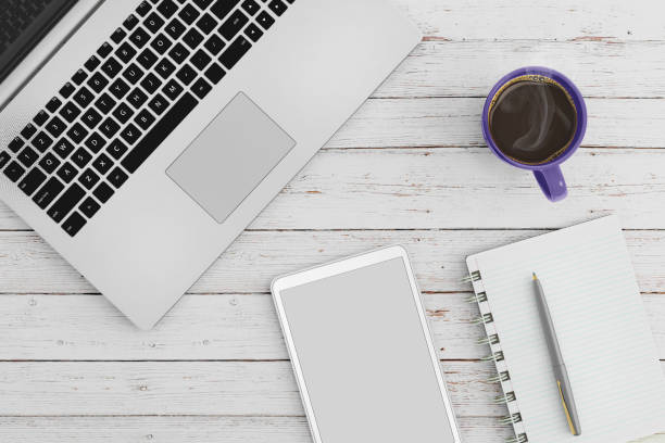 istock Knolling business desk view with laptop 892300890