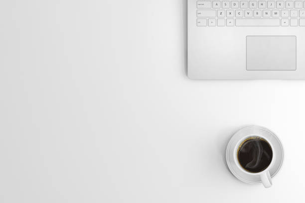 istock Knolling business desk view with laptop 892300942
