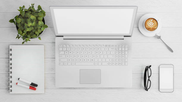 istock Knolling business desk view with laptop 892302060