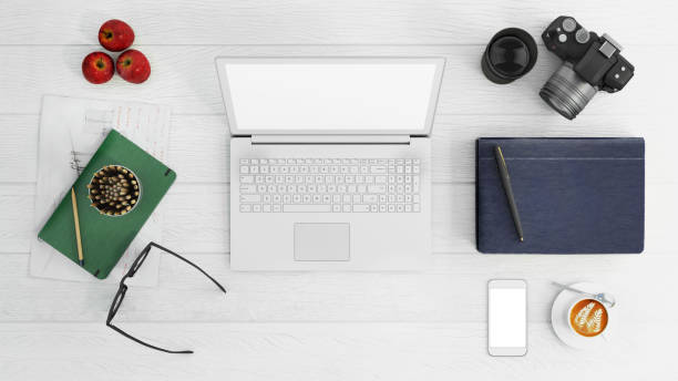 istock Knolling business desk view with laptop 892302536
