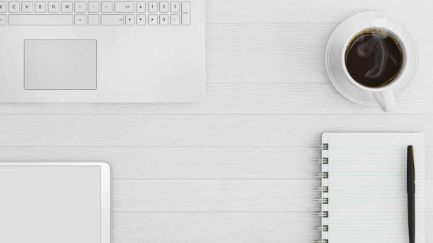 istock Knolling business desk view with laptop 892303058