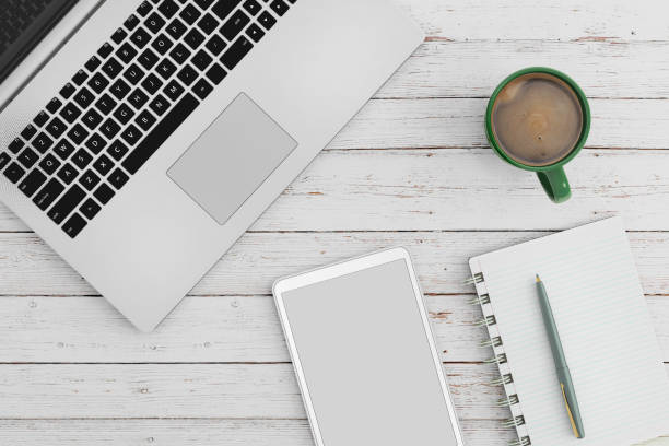 istock Knolling business desk view with laptop 892303062