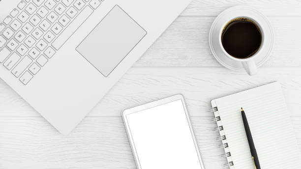 istock Knolling business desk view with laptop 892303070