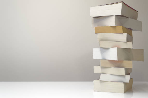 istock Pile of books on the table 892306502