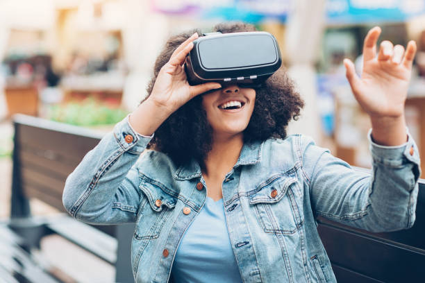 istock Virtual reality outdoors in the city 892333698