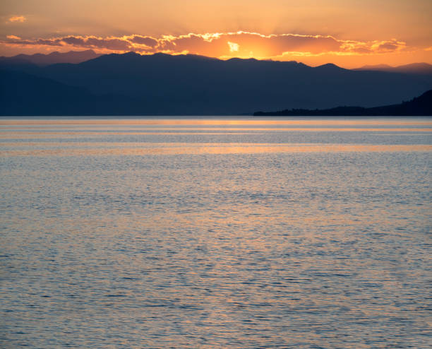 istock The Aegean Sea in Greece at sunset 892333776