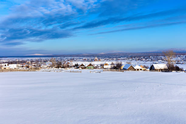 istock Winter village bright sunny day 892338484