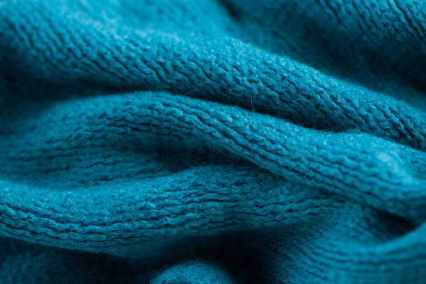 The texture of a cozy warm blue scarf
