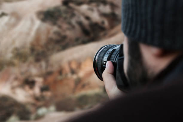 istock Photographer take picture of a view 892348752