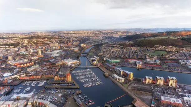 Editorial SWANSEA, UK - DECEMBER 12, 2017: An aerial view of the River Tawe in Swansea City, showing the new development around the Prince of Wales Dock, St Thomas, Port Tennant and Kilvey Hill