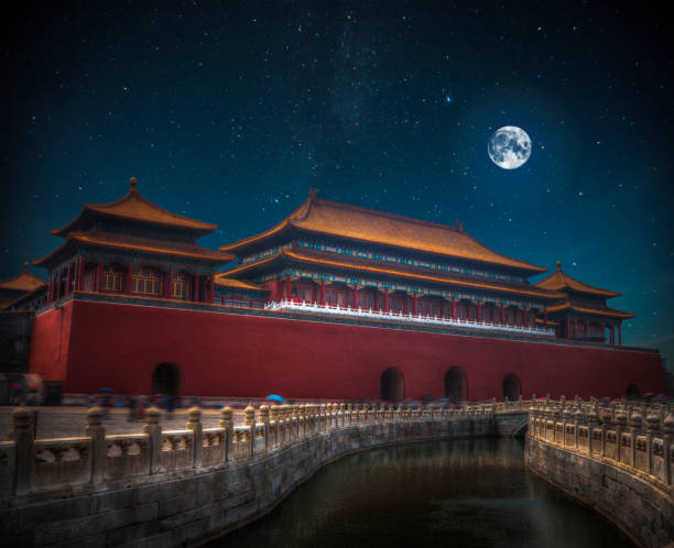 istock At night the moon and stars shine. 892354574
